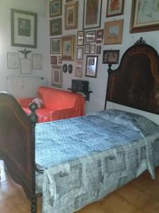 Llit o llits en una habitació de B&B A due passi dal Castello