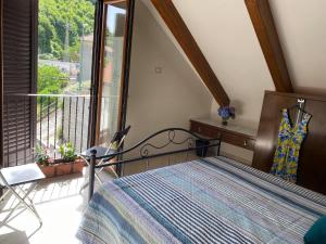 A bed or beds in a room at Casa Nonna Anna