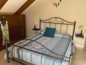 A bed or beds in a room at Casa Nonna Anna