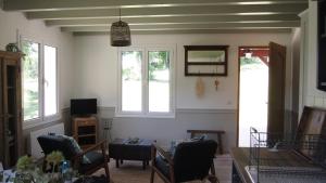 TV/trung tâm giải trí tại La Petite Maison de la Villa Xaran Erdian