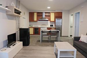 Kuchyň nebo kuchyňský kout v ubytování Apartamentos Credencial
