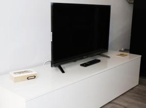 TV a/nebo společenská místnost v ubytování Apartamentos Credencial