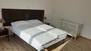 Ένα ή περισσότερα κρεβάτια σε δωμάτιο στο Appartamento Le Rose