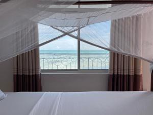 Φωτογραφία από το άλμπουμ του Visitor's Inn σε Jambiani