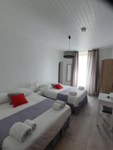 Postel nebo postele na pokoji v ubytování Ma Petite Auberge