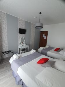 Postel nebo postele na pokoji v ubytování Ma Petite Auberge