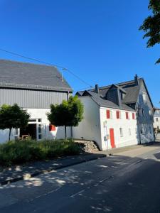 a group of buildings on the side of a street at Landhaus am Rheinsteig & Loreley in Lykershausen