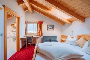 Кровать или кровати в номере Residence Alpenrose