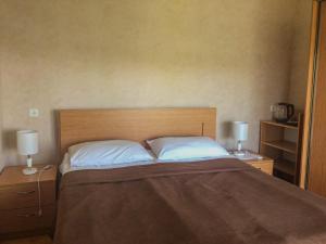 Ένα ή περισσότερα κρεβάτια σε δωμάτιο στο Guest House Maradona