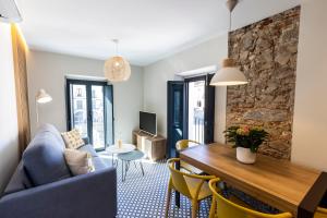 Posezení v ubytování Apartamentos El Patio Plaza Mayor Cáceres
