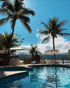 Bazén v ubytování Pousada Cantinho D'Abrantes - Próximo as Melhores Praias de Ilhabela - Veloso e Curral nebo v jeho okolí