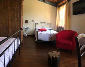 Postel nebo postele na pokoji v ubytování B&B BAGOLARI