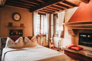 Postel nebo postele na pokoji v ubytování B&B BAGOLARI