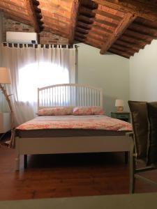Postel nebo postele na pokoji v ubytování B&B BAGOLARI