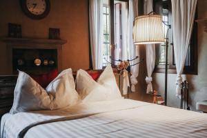 Postel nebo postele na pokoji v ubytování B&B BAGOLARI