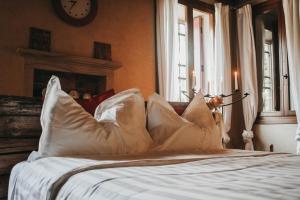 Postel nebo postele na pokoji v ubytování B&B BAGOLARI