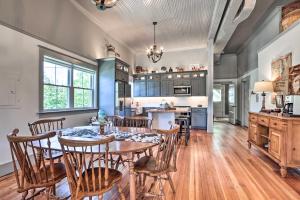 a kitchen and dining room with a table and chairs at The Ruebling House Bright, Modern, and Renovated! in Defiance