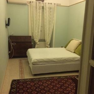 Posteľ alebo postele v izbe v ubytovaní Apt via cernaia center of rome