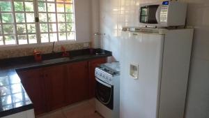 Virtuvė arba virtuvėlė apgyvendinimo įstaigoje Sitio Espelho Dagua - Brotas SP