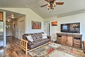 a living room with a couch and a sink at Estes Park Mountain-View Retreat 3 Miles to RMNP! in Estes Park