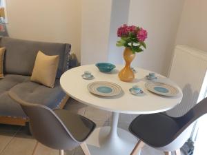 Posezení v ubytování Comfortable apartment in the center of Volos very close to the port + 6 fotografií