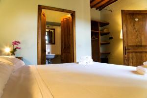 Voodi või voodid majutusasutuse Paradiso in Chianti toas