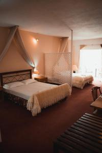 Cama o camas de una habitación en Villa Olympia