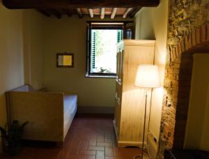 Voodi või voodid majutusasutuse Paradiso in Chianti toas