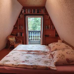 Postel nebo postele na pokoji v ubytování Finnhaus Neubauer
