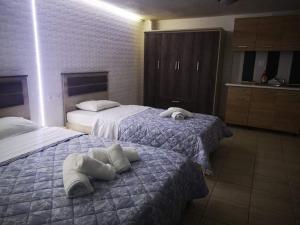 Postel nebo postele na pokoji v ubytování Gatos Beach