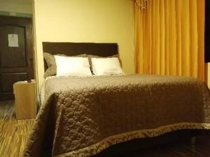 Postel nebo postele na pokoji v ubytování Hostal Inca