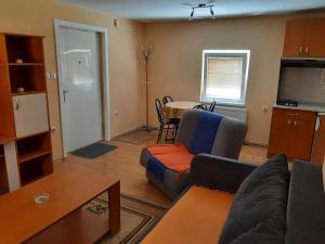 Kuchyň nebo kuchyňský kout v ubytování Apartment MK
