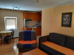 Kuchyň nebo kuchyňský kout v ubytování Apartment MK