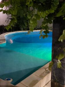 Bazén v ubytovaní Casa Beira Mar Itamaracá alebo v jeho blízkosti