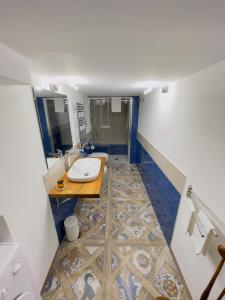a bathroom with a sink and a toilet in it at Coco's Apartment in Meta