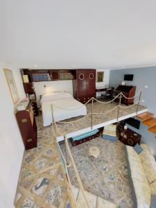 a view of a bedroom with a bed and a room at Coco's Apartment in Meta