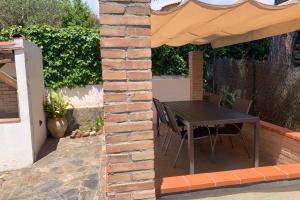 A patio or other outdoor area at Casa con piscina en la Costa Brava