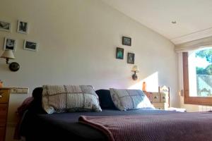 A bed or beds in a room at Casa con piscina en la Costa Brava