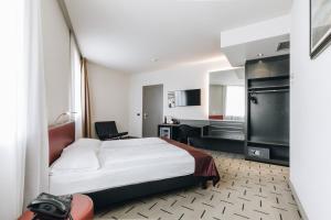 Kuchyň nebo kuchyňský kout v ubytování Hotel Continental