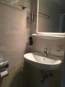 Koupelna v ubytování Hotel Astoria