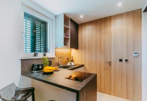 Kuchyň nebo kuchyňský kout v ubytování Luxury rooms il Ponte Trogir