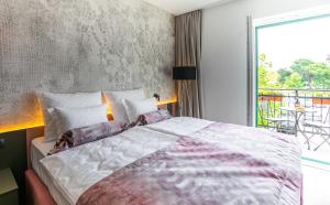 Postel nebo postele na pokoji v ubytování Luxury rooms il Ponte Trogir