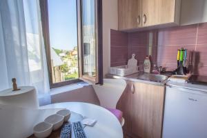 Cucina o angolo cottura di Apartmani ALBION