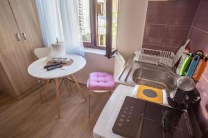 Cucina o angolo cottura di Apartmani ALBION