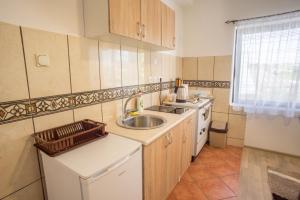 Cucina o angolo cottura di Apartmani ALBION