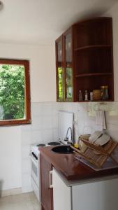 A kitchen or kitchenette at Apartments Almaja Villa