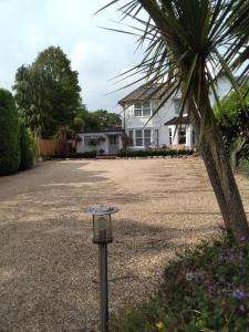 a parking meter in front of a house at Southernhay Guest House in Bournemouth