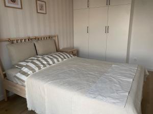 Posteľ alebo postele v izbe v ubytovaní Apartament Słoneczna Zatoka