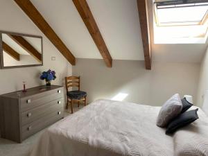 A bed or beds in a room at Casa Nonna Anna
