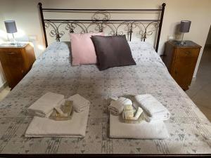 A bed or beds in a room at Casa Nonna Anna